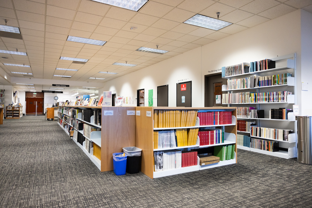 Photo of bookshelves inside the CalArts Library