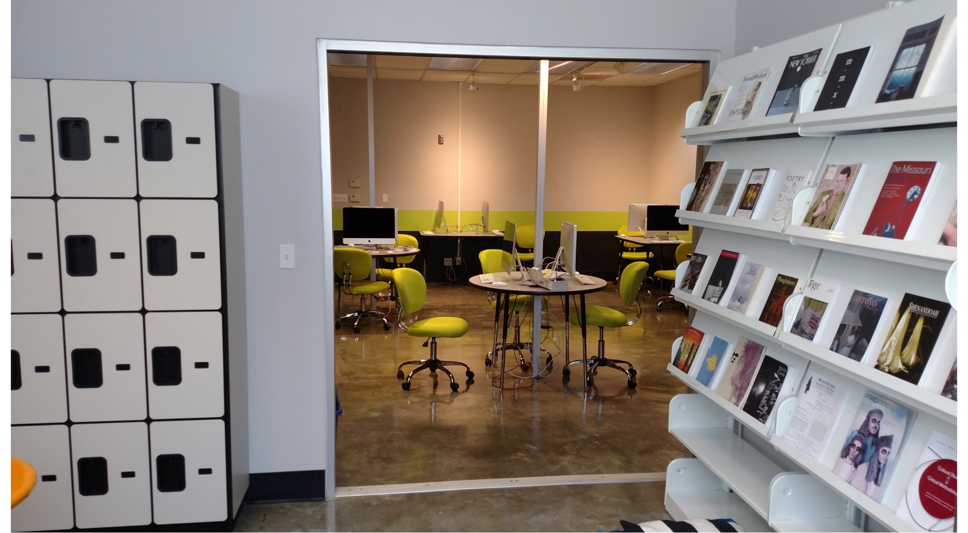 A room with computers at CalArts, for Critical Studies graduate students. 