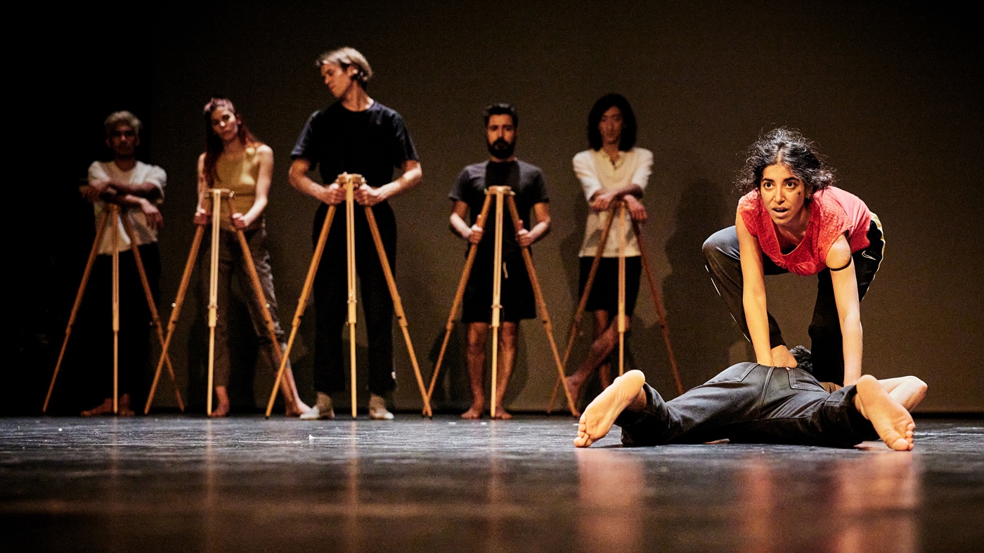 Photo of a stage performence with seven people