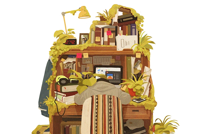 A cluttered desk overgrown with plants and a person resting their head on it.