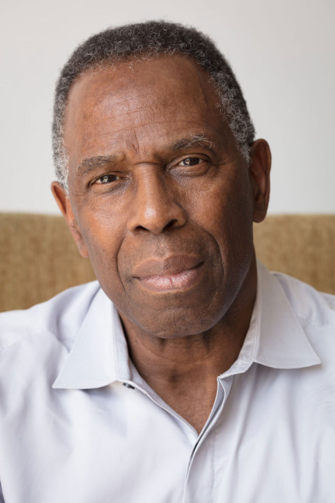 Headshot of Charles Gaines wearing a white shirt