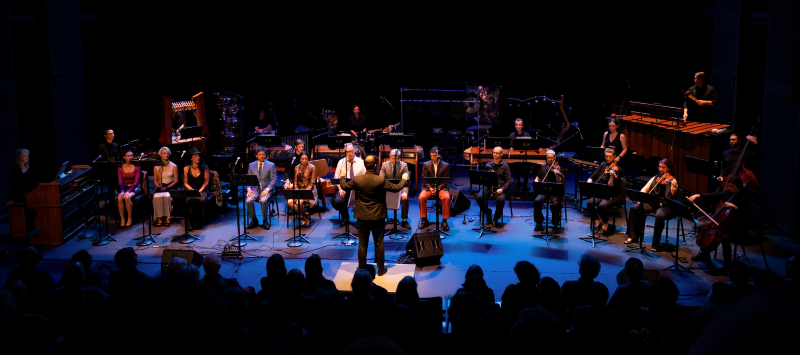 man conducting an orchestra