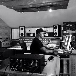 CalArts Faculty member John Baffa sits in the recording studio. 