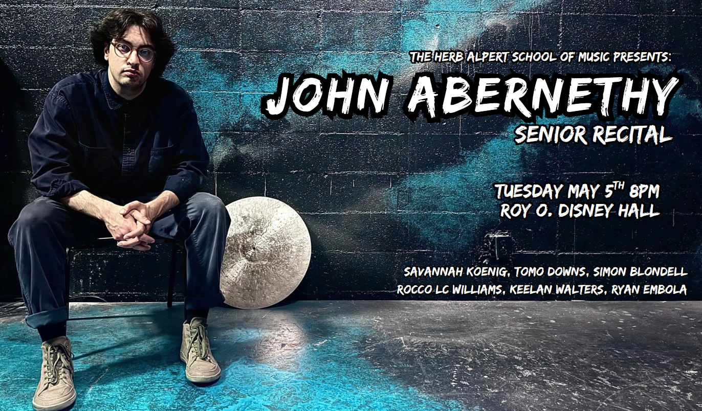 Person seated against a blue and black painted wall with text announcing a senior recital.