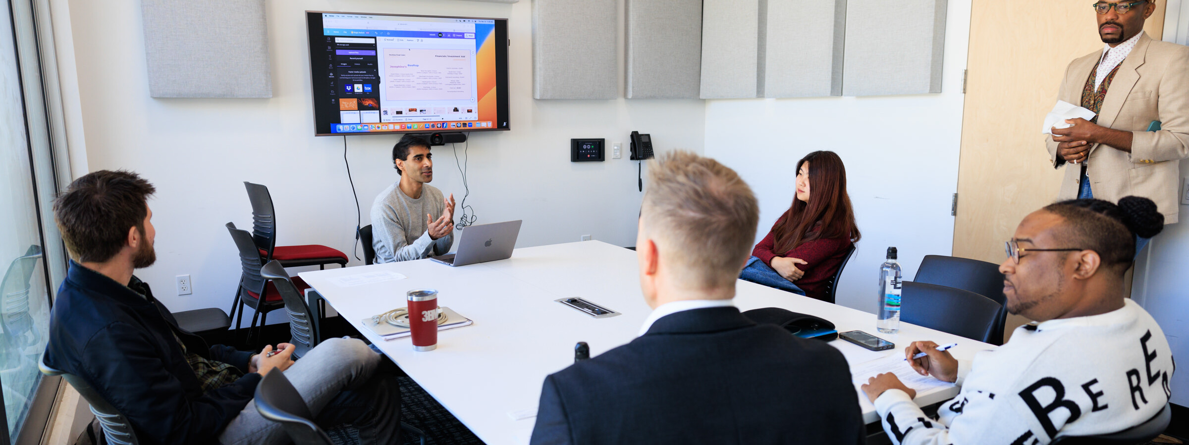 Group of people having a meeting in a room