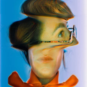 Abstract distorted portrait of a person with glasses against a blue background.