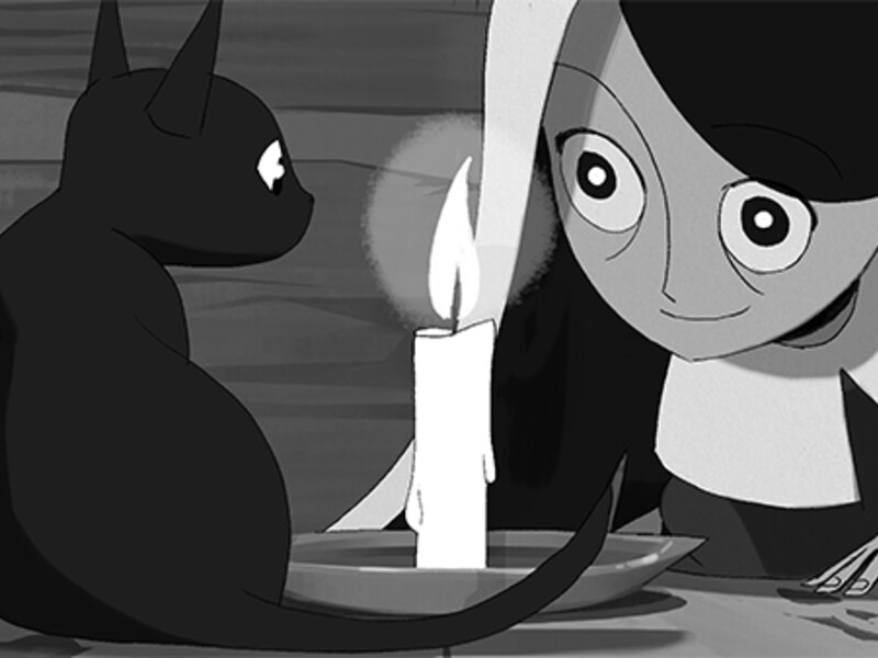 A black cat and a girl with large eyes looking at a lit candle on a plate.