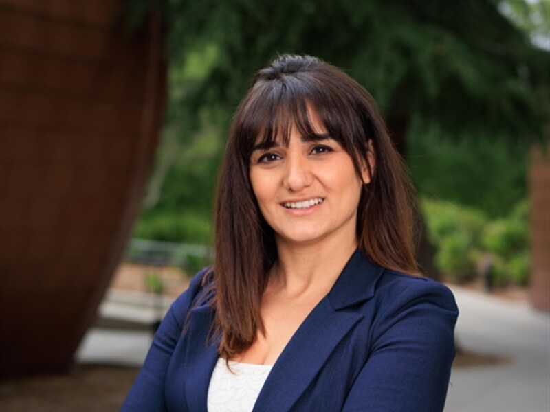 Photo of Irene Scholl-Tatevosyan with trees in the background