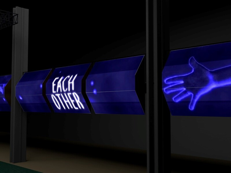 Digital display panels showing a glowing blue hand and the text "EACH OTHER."