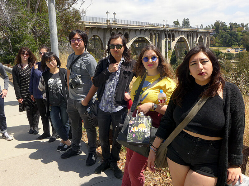 LA Urbanscape and Public Persona class at CalArts, featuring students in a group in front of colorado street bridge