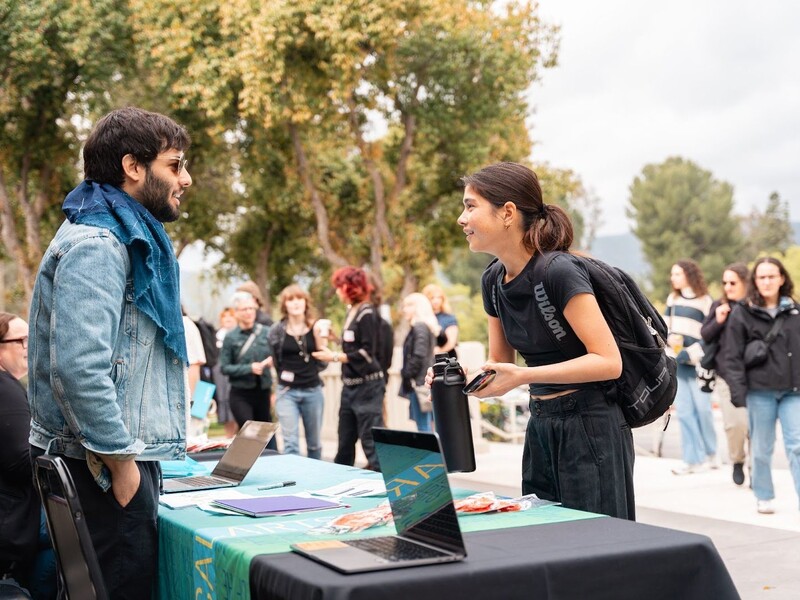 Students speaks with CalArts Admissions Counselor