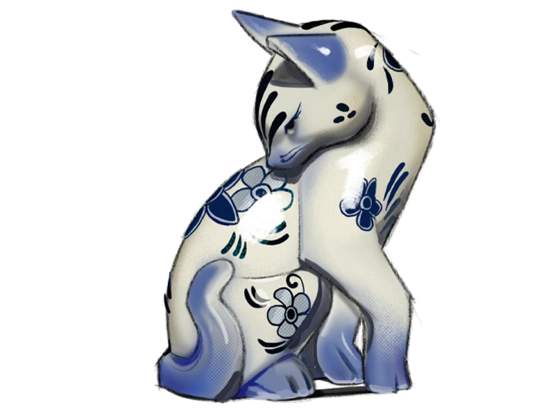 A white ceramic-like cat figurine with blue floral patterns.