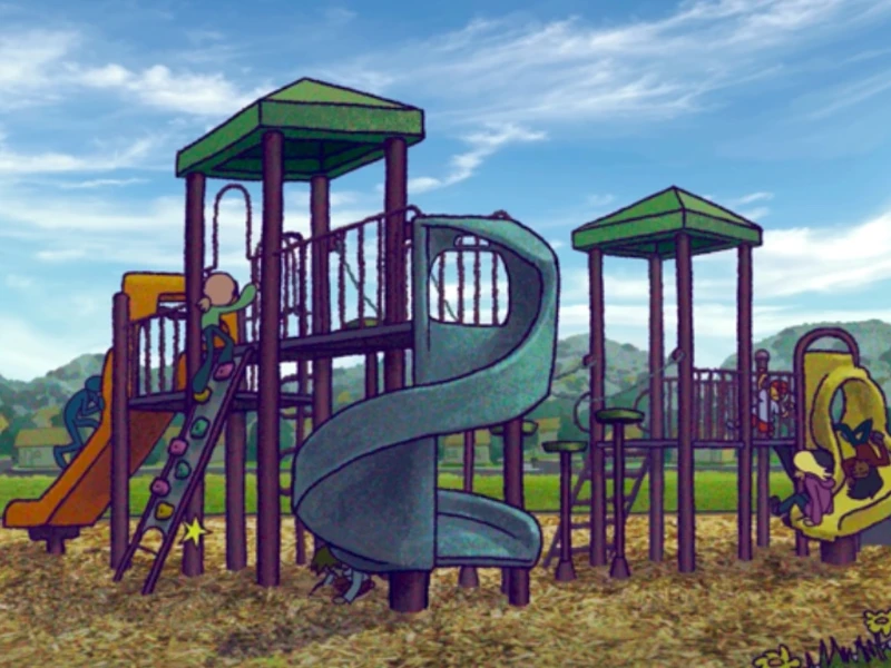 A playground with slides and a spiraling structure against a backdrop of hills and clouds.