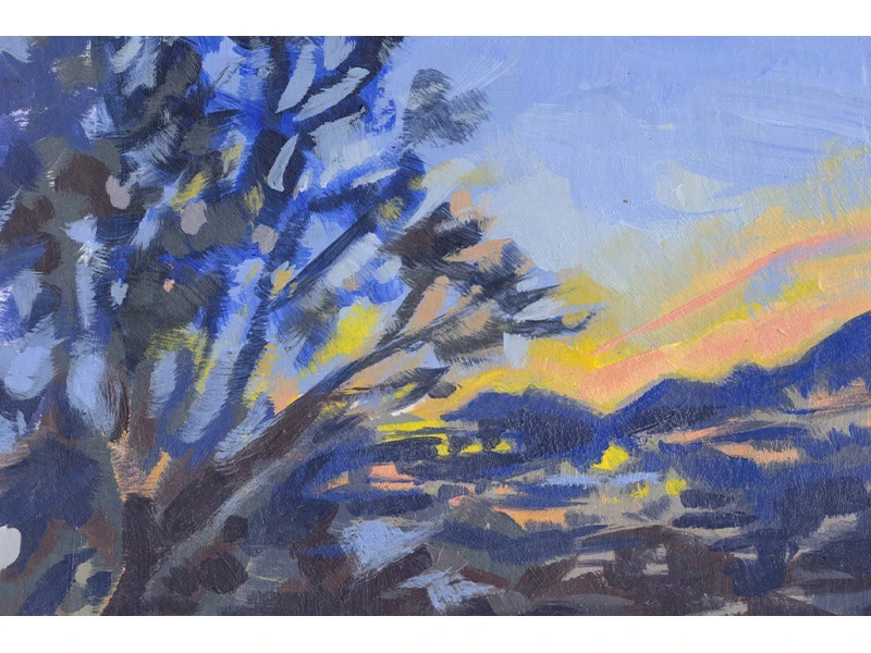 A landscape painting of a colorful sunset with a tree on the left, set against a blue, yellow, and orange sky with silhouetted hills.