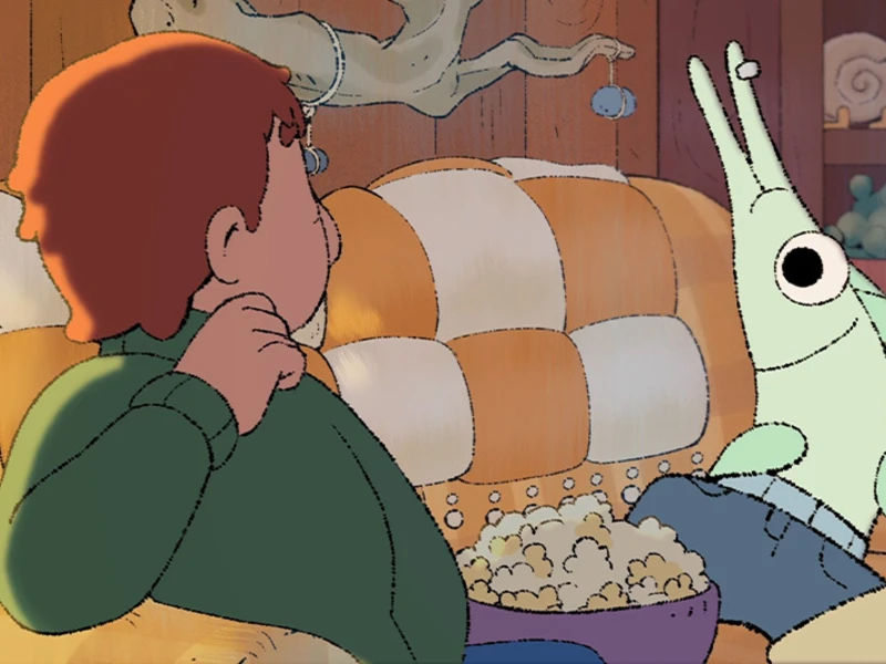 Two animated characters sitting on a checkered sofa with a bowl of popcorn.