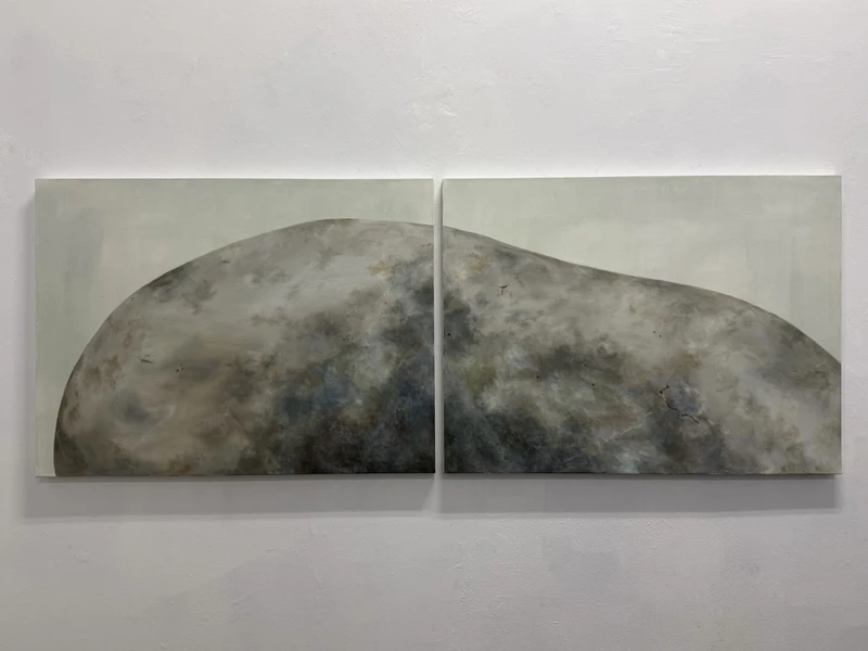 A two-panel painting of a large, abstract rounded form with a cloudy texture on a light gray background.