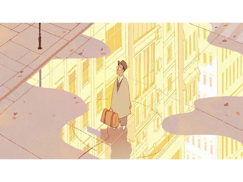 A man with a suitcase stands on a city sidewalk with puddles reflecting a tall building.