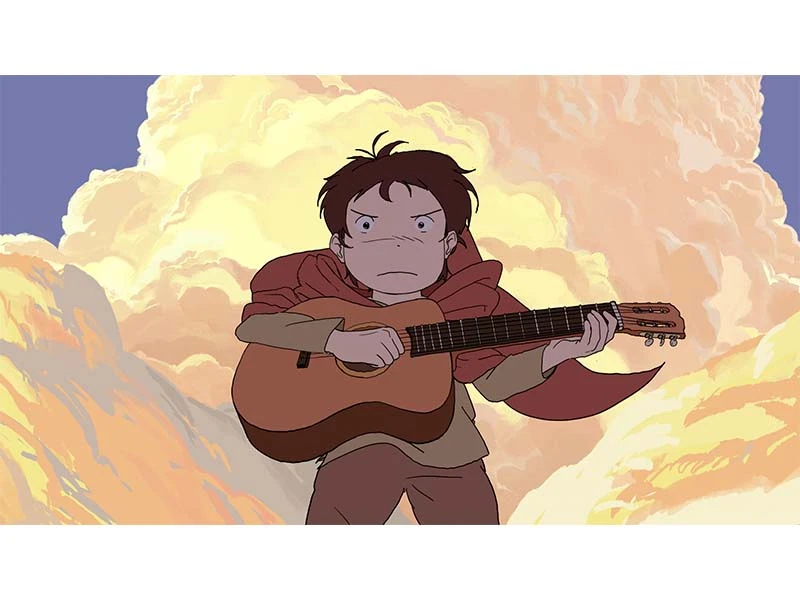 Boy holding a guitar against a backdrop of dramatic orange clouds.