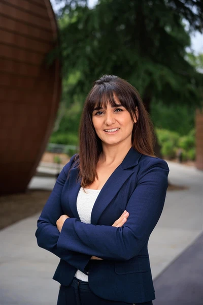 Photo of Irene Scholl-Tatevosyan with trees in the background