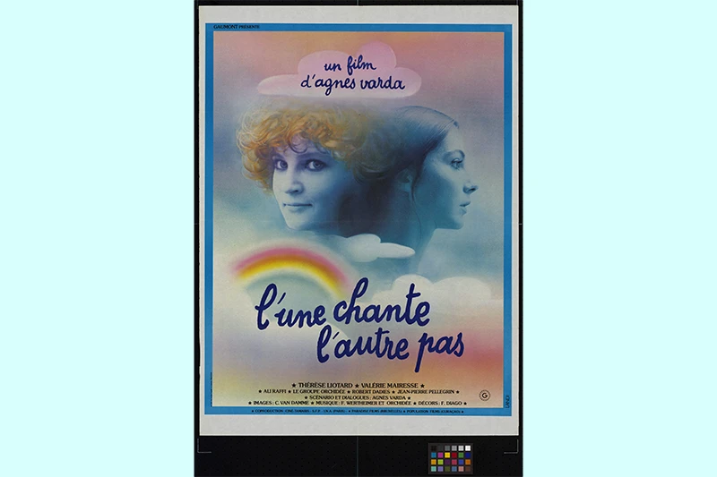 Poster with two women's faces, a rainbow, and bold text on a pastel background.
